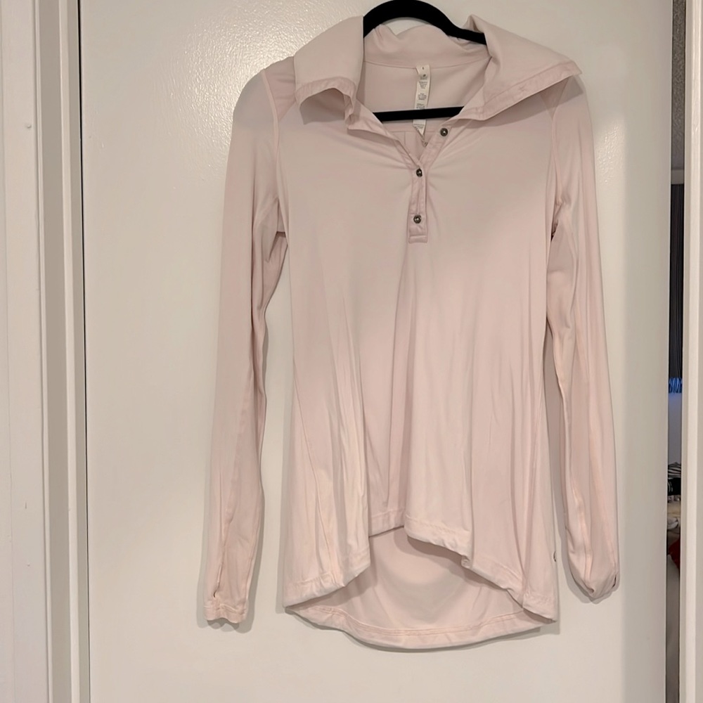 Soft pink Lululemon long sleeve pull over.  Reflection tape on back.